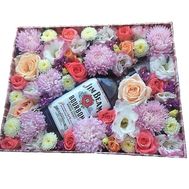Flowers and whiskey in a box
