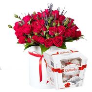 Bouquet of roses spray in a box with sweets