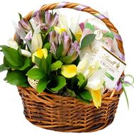 Basket with flowers and sweets