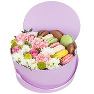 Macarons and flowers in a box