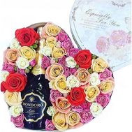 Champagne with flowers in a box
