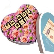 Flowers with candies in a box