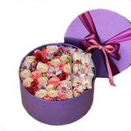 Box with flowers and sweets