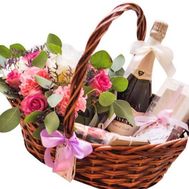 Basket with flowers and champagne