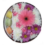 Makarons in a box of flowers