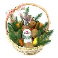 Martini and fruits in a New Year's basket