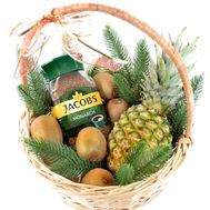 Christmas basket with coffee and fruits