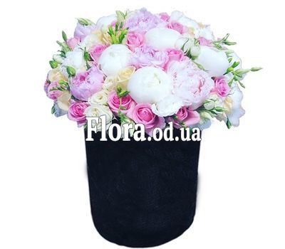 Bouquet with peonies in a box