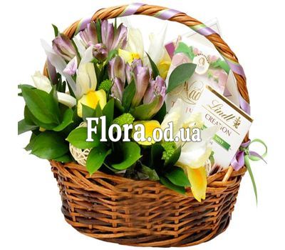Basket with flowers and sweets