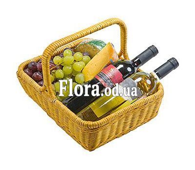 Basket with wine and grapes