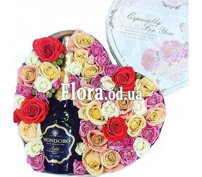 Champagne with flowers in a box