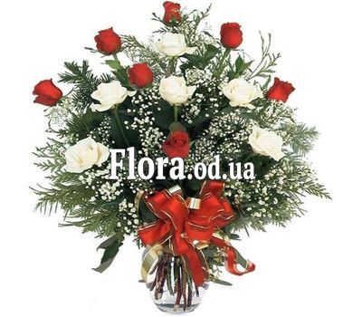 A bouquet of roses with spruce