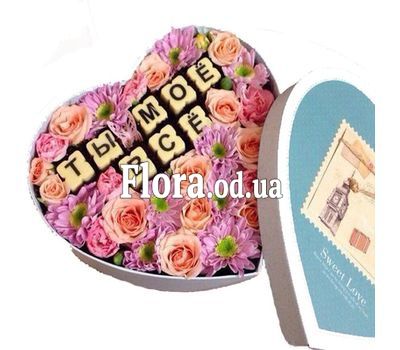 Flowers with candies in a box