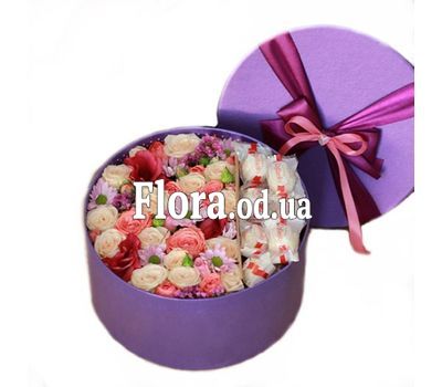 Box with flowers and sweets
