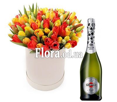 Tulips in a box with champagne